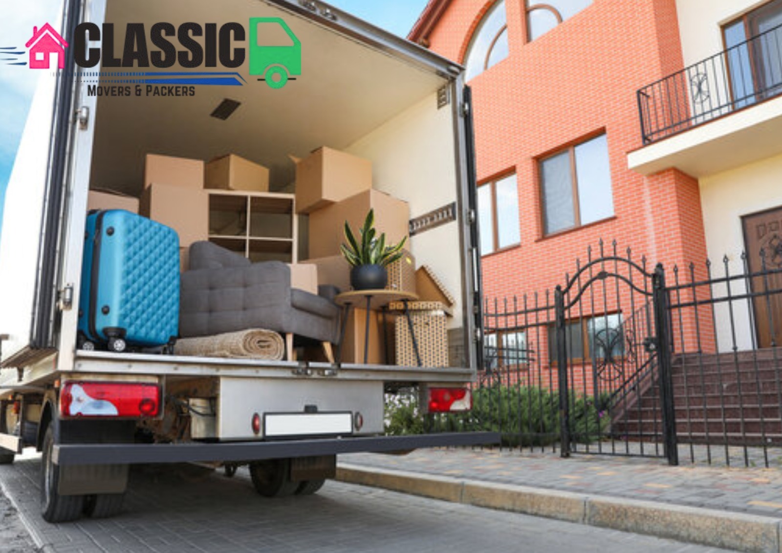 Professional movers in JLT loading furniture and household items during a relocation in Dubai